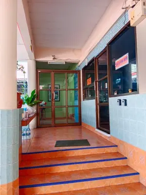 an entrance to a building with a glass door at Worakarn Apartment 2 in Bangkok