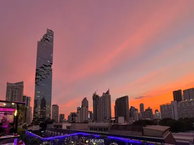 a view of a city skyline at sunset at Heaven Boutique Hotel in Bangkok