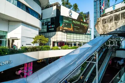 an escalator in the middle of a city at XX GO INN Sukhumvit 20 Bts Asoke-Phrom Phong in Bangkok