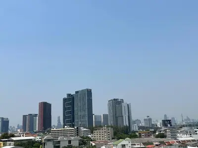 a view of a city with tall buildings at Monte Rama 9 near JodFair Market in Bangkok