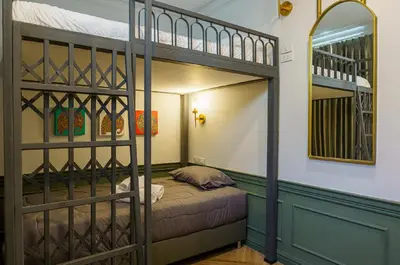 a bunk bed room with a bunk bed in a room at Ci home in Pom Prap