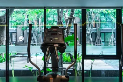 a camera on a tripod in front of a window at 1bed room bts thonglo SuperiorSpaApartment in Ban Chaliang Khok