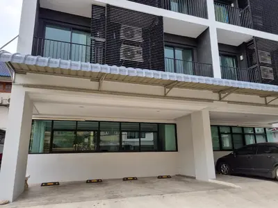 a car parked in front of a building at Tiara Place in Bangkok